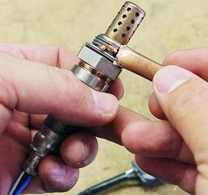Before installing a new oxygen sensor, apply anti-seize lubricant on the threads in order to create a tight, corrosion-free seal.