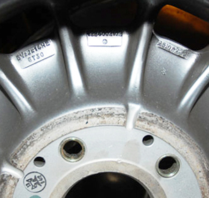 One fail-safe way to tell any original Fuchs-made factory wheels from aftermarket ones is the locations of the serial numbers.  Fuchs wheels have them on the inside, and aftermarket wheels have them on the outside.