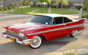 Stephen King makes one accidental reference to the '58 Plymouth in the book as a "sport coupe".  Above, a '58 Fury Sport Coupe similar to how it was cast in the 1984 movie.