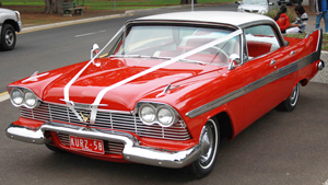 Unlike the 1984 movie, the 1958 Plymouth Fury in Stephen King’s book “Christine” was actually described as a four-door in almost every reference.  The author did not distinguish whether it was a sedan with pillars between the doors, or whether it was a hardtop sedan model with no door posts (shown above).  We’ll assume it was a hardtop model, simply because they look so much better.