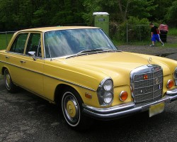 yellow 1970 Mercedes 280SE