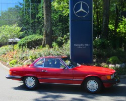 red 1986 Mercedes 560SL