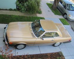 gold 1988 Mercedes 560SL