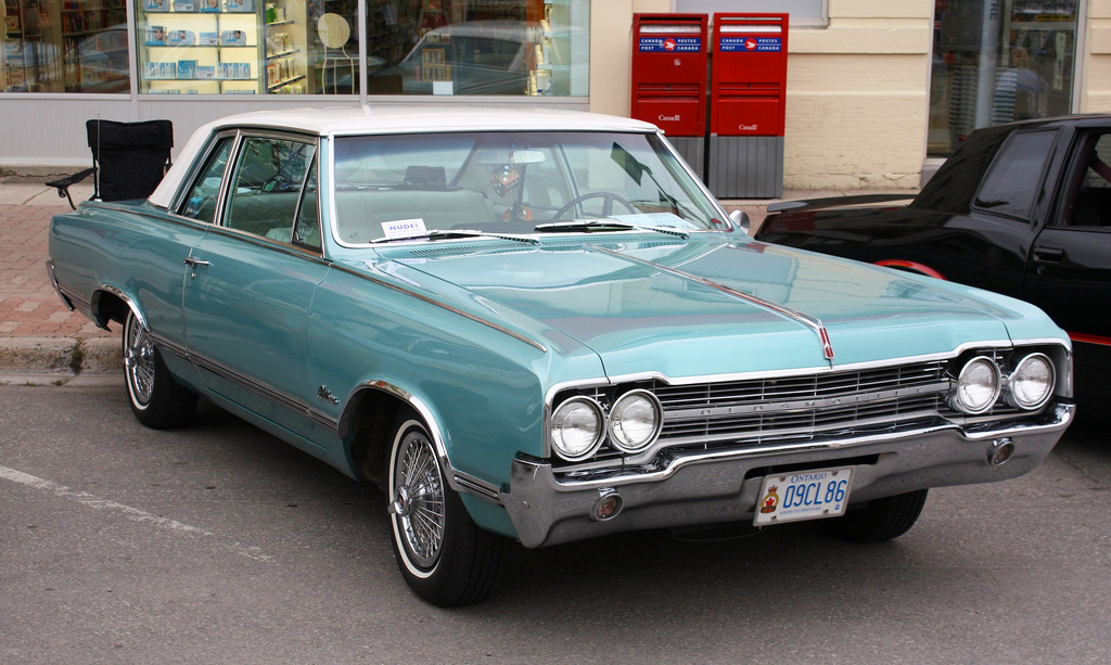 1965 Oldsmobile Cutlass F-85 with wire wheel covers