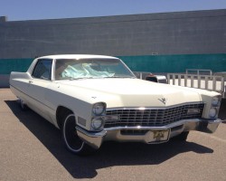white 1967 Cadillac coupe de ville