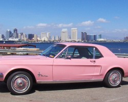 1968 pink Ford Mustang wire wheel covers