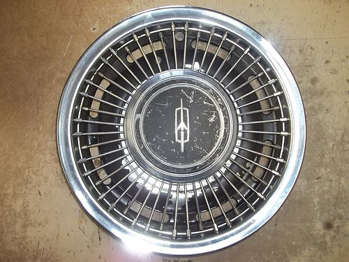 1969 Oldsmobile 14-inch wire wheel cover intermediates