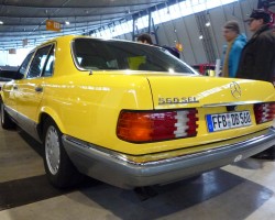 yellow Mercedes 560SEL 126