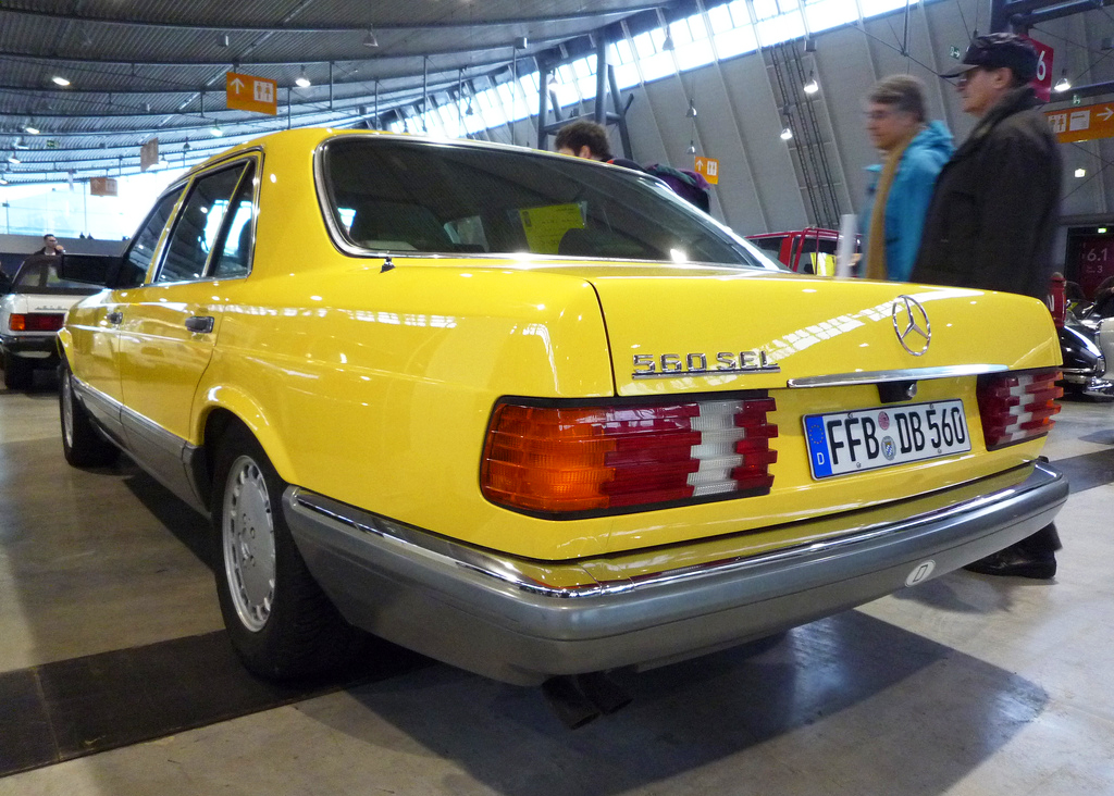 yellow Mercedes 560SEL 126