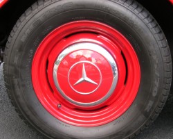 red 1963 Mercedes color matched hub cap
