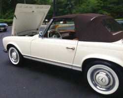 white 1964 Mercedes 230SL