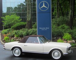 white 1964 mercedes 230sl