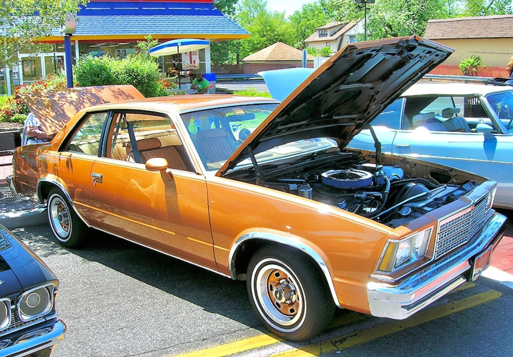 A 1979 Chevrolet Malibu coupe, equipped with factory color-matched rallye sport wheels.