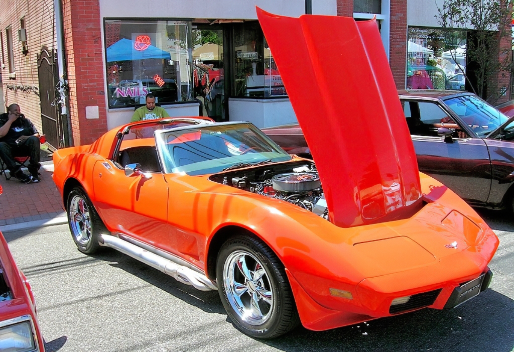 1977 Chevrolet Corvette, equipped with popular removable t-top option. Side exhaust pipes and wheels are not stock.